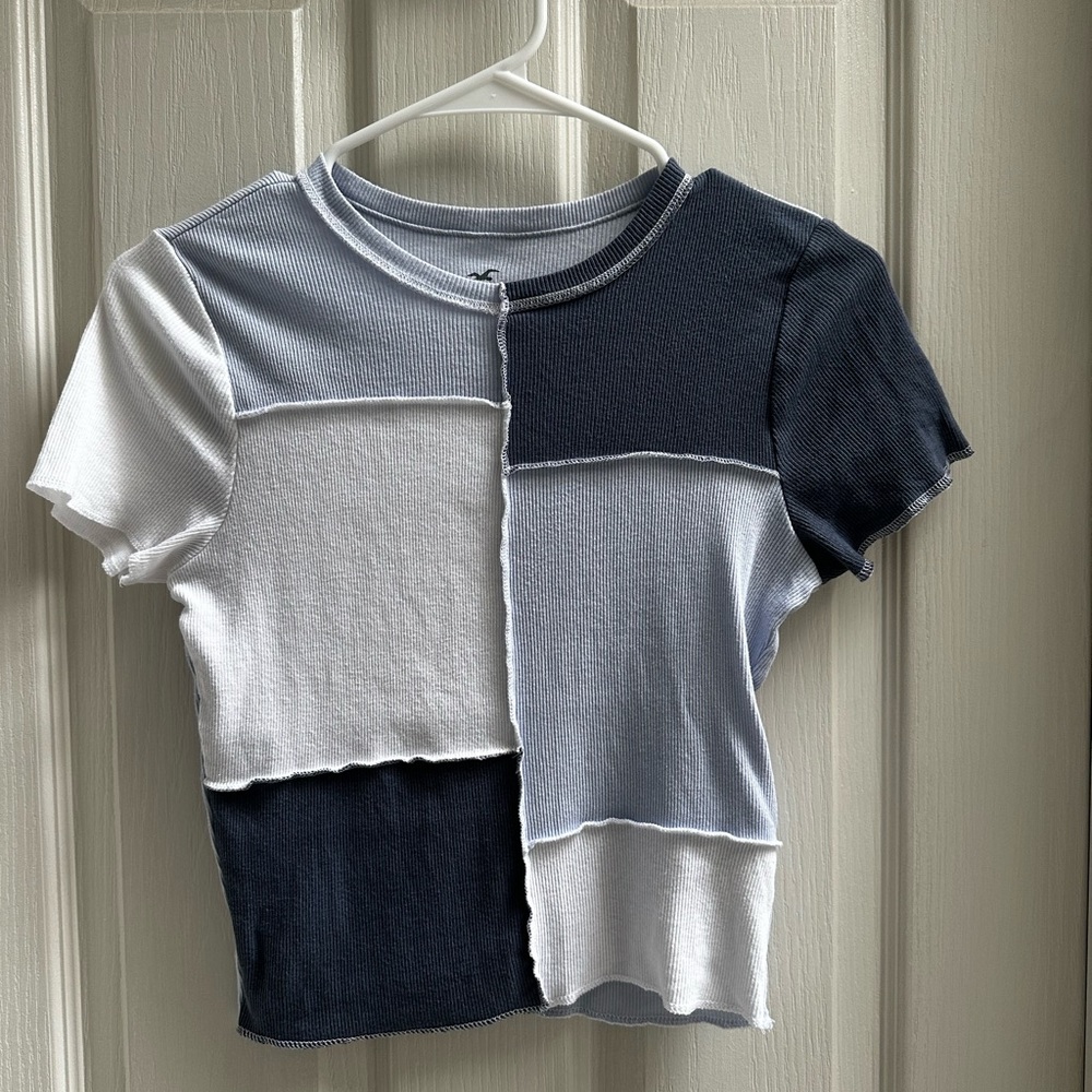 navy, light blue and white Hollister patchwork baby tee